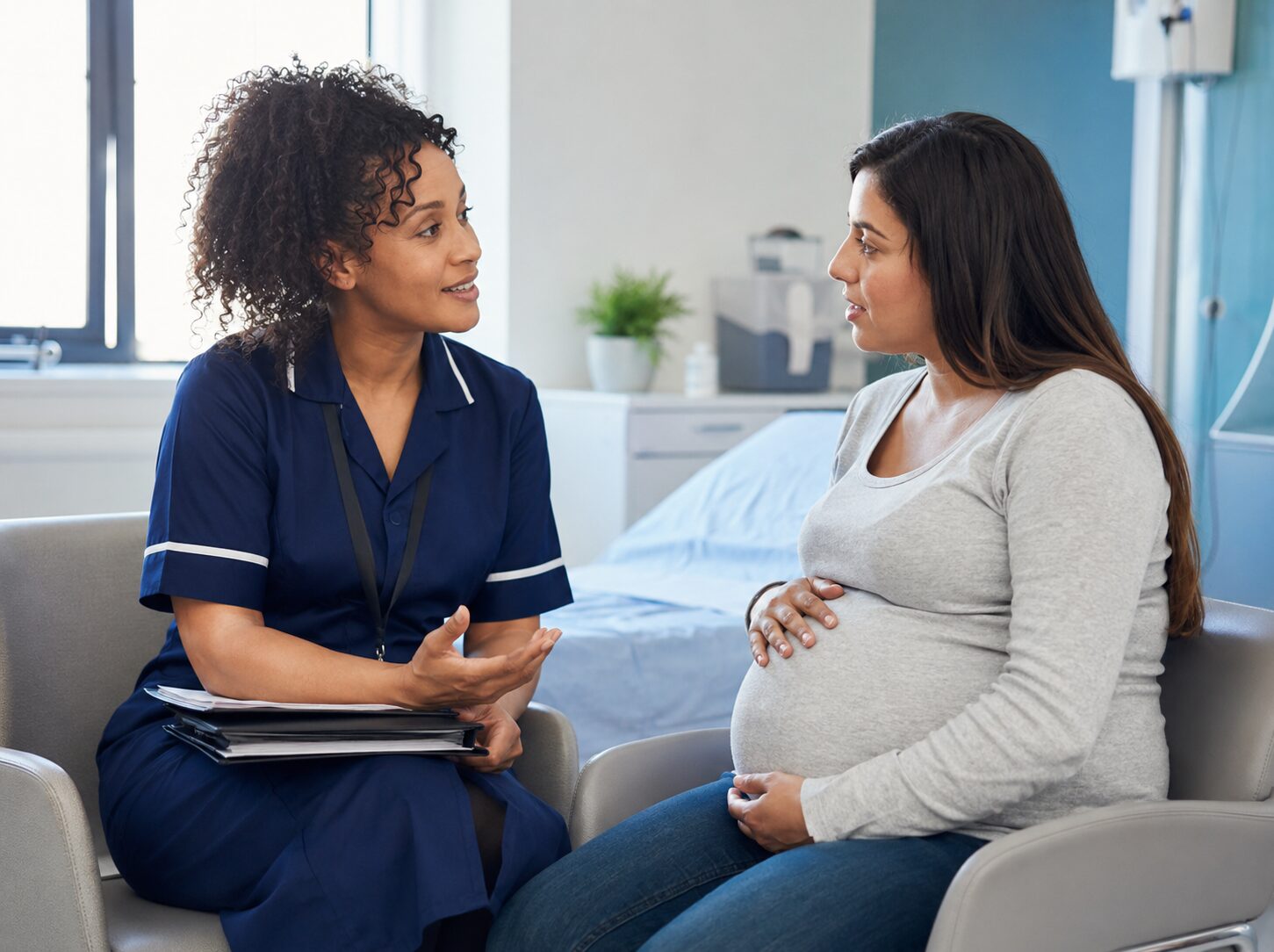 A midwife discusses care options with an expectant mother