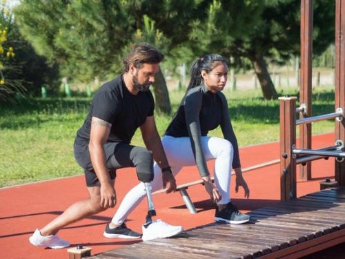 Sports Therapy Sports therapist with client