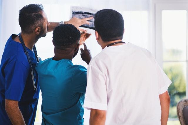 Healthcare Professionals Healthcare rofessionals looking at an X-Ray